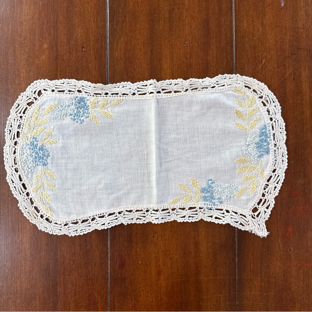 Hand-Embroidered White Linen Doily with Blue Floral Accents